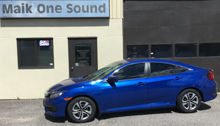 Blue 2017 Honda Civic with professional automotive window film